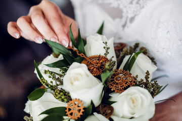 Wedding bouquet of the bride in women's hands. wedding flowers. Bridal bouquet of fresh flowers, wedding concept