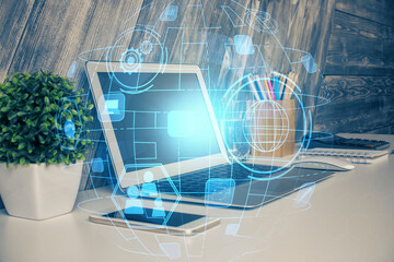 Computer on desktop with social network theme icon. Multi exposure. Concept of international connections.