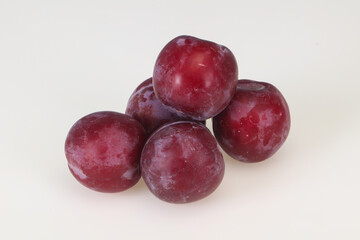Sweet ripe plum isolated on white
