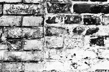 Texture of a brick wall with cracks and scratches