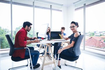 Group of business people or creative designer talking and meeting or discussion in conference room, team brainstorming new marketing project, colleagues teamwork working together