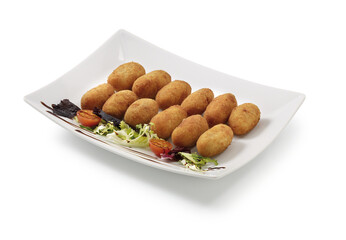 Croquettes with salad on white background