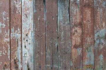 Close-up of old worn brown vertical wood panels, stripes, wood Texture