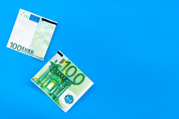 Cutting of euro banknote. Economic crisis concept