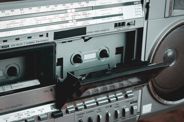 Close-up of a retro stereo cassette recorder.