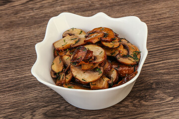 Roasted champignon with herbs and spices