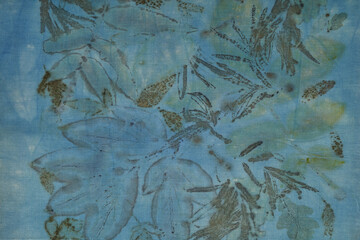 Fragment of hand-dyed fabric using eco-print technique