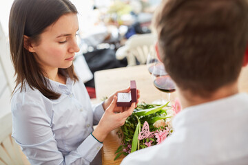 Wife receives wedding ring from husband for marriage proposal