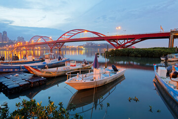 Early morning scenery of boats parking by riverside and in the background, the beautiful landmark Guandu Bridge spanning across Tamsui River in Taipei, Taiwan, Asia
Classical  waterfront  scenery