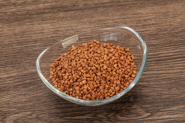 Raw buсkwheat cereal in the bowl