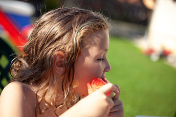 boy eat watermelon stock photo