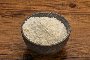 Wheat flour heap in the bowl