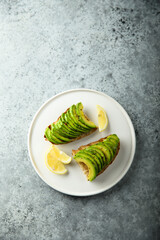 Homemade avocado toast with lemon