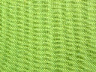 Green color Burlap fabric textured background