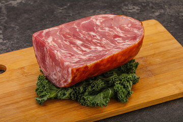 Beef ham piece over board