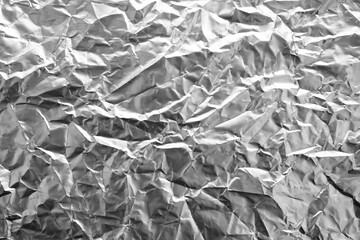 Shiny silver gray foil texture background industry.
