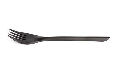 disposable black plastic fork isolated on white background