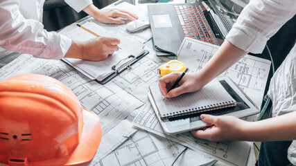 architect design working drawing sketch plans blueprints and making architectural construction...