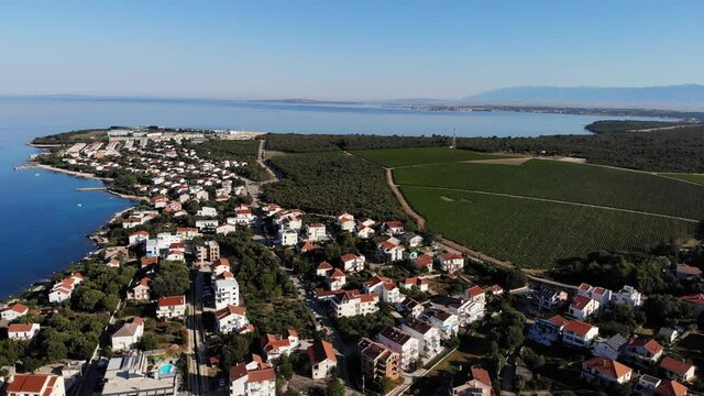 Petrcane, Zadar, Croatia, Europe: Drone footage of coastline and vineyards / June 30th 2020