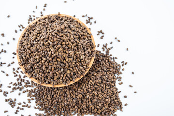 A saucer of cassia tea on white background