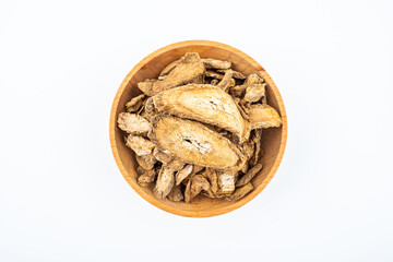 Burdock tea on a saucer on white background