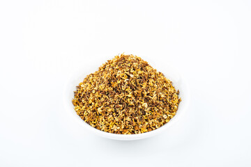 Osmanthus tea in a saucer on white background