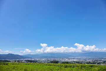 夏の風景 山麓線沿いから塩尻市内と山々を望む 長野県塩尻市
