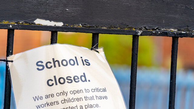 Close-up of sign for a school closed during COVID-19 pandemic