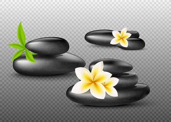 Black shiny SPA massage stones with plumeria flowers and green leaves