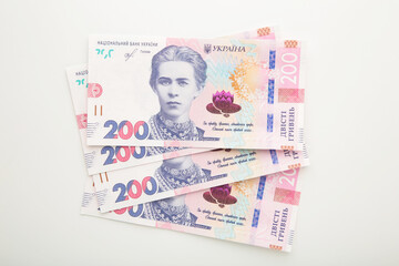 Banknotes Ukraine 200 hryvnia on white background. Ukrainian Money with copy space
