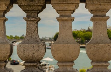 Fototapeta na wymiar Stone Columns in Front of River Seine Paris 