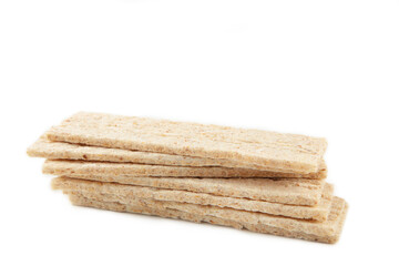 A slices of wheat crispbread isolated on white background.