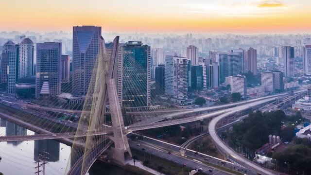  The Octavio Frias de Oliveira bridge or Ponte Estaiada cable stayed suspension bridge built over the Pinheiros River in the city of Sao Paulo, Brazil. Aerial Hyper lapse 