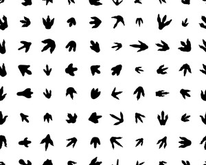 Fototapeta na wymiar Seamless pattern with footprints of dinosaurs on white background