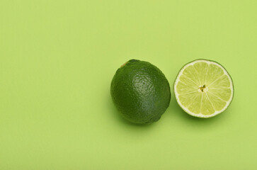 Lime slice on green background