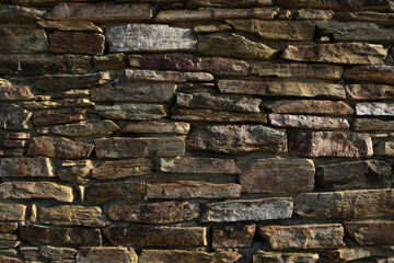 Stone wall contruction background textue