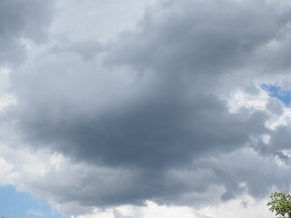 Obraz premium Cloudy sky full of deep grey clouds. Storm is coming.