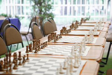 
Chess board with figures before starting chess tournament
