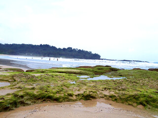 Rocky coast of the Seupang Beach around Sawarna Banten Indonesia