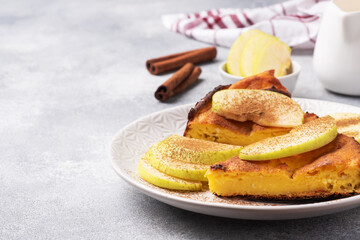 Cottage cheese casserole with apples and cinnamon spices. Concept of a healthy Breakfast. Copy space