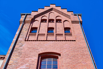 Beschaffenheit einer roten Ziegelsteinwand eines Geb&auml;udes	
