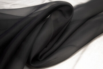 Twisted twirl of organza fabric gray texture