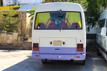 A white van parked on a street in Kyrenia. Cyprus.