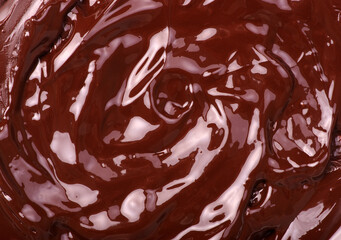 Melted chocolate natural dark background