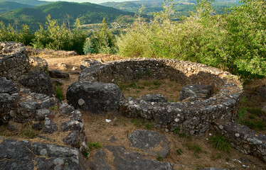 pre-roman stone constructions where the Celts lived surrounded by vegetation