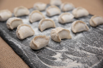 homemade dumplings on a black background