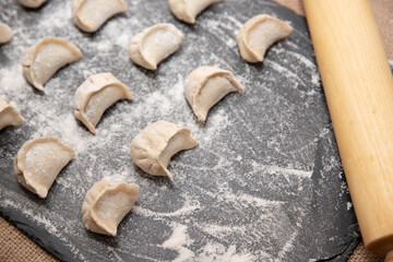homemade dumplings on a black background