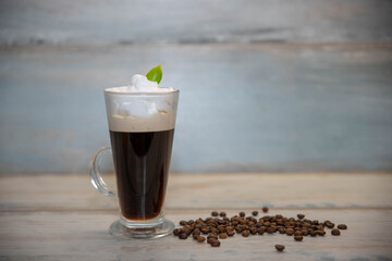 glass Cup with coffee and coffee beans