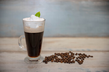 glass Cup with coffee and coffee beans