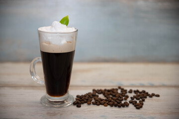 glass Cup with coffee and coffee beans